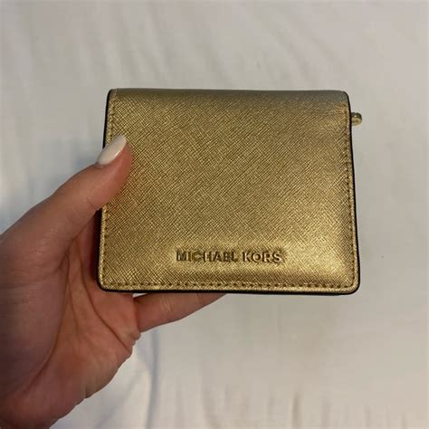 michael kors gold wallet women.